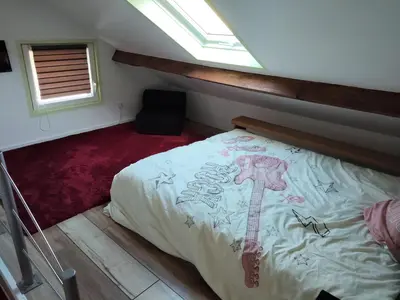 Un ou plusieurs lits dans un hébergement de l'établissement Au Ch'ti Marnais. Gîte au cœur des vignes.