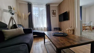 Télévision ou salle de divertissement dans l'établissement La Symphonie