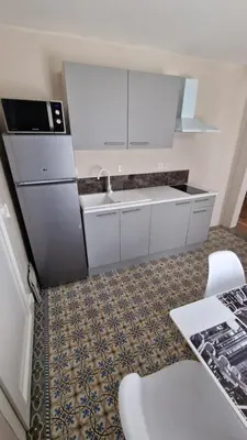 Cuisine ou kitchenette dans l'établissement La Symphonie