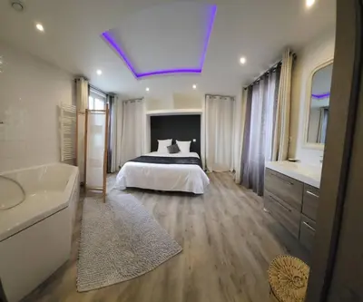 Un ou plusieurs lits dans un hébergement de l'établissement Appartement avec baignoire - Hautvillers