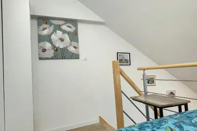 Un ou plusieurs lits dans un hébergement de l'établissement Sublime appart rénové duplex centre ville 4pers wifi