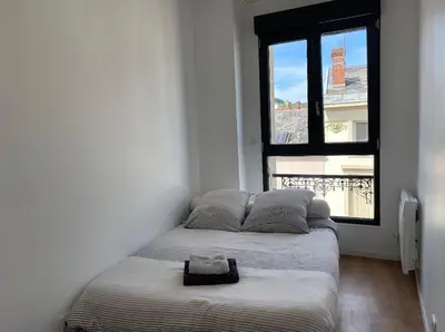 Un ou plusieurs lits dans un hébergement de l'établissement Millésime magnifique appart centre Epernay