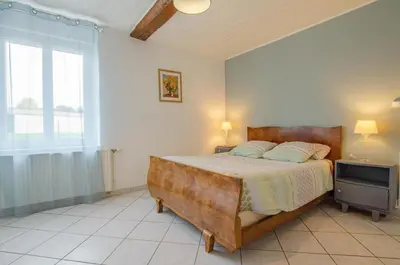 Un ou plusieurs lits dans un hébergement de l'établissement Le gite de saint martin