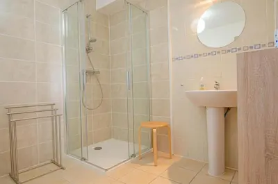 Salle de bains dans l'établissement Le scipion