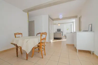 Cuisine ou kitchenette dans l'établissement Le scipion