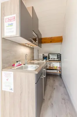 Cuisine ou kitchenette dans l'établissement Le gite du pigeonnier