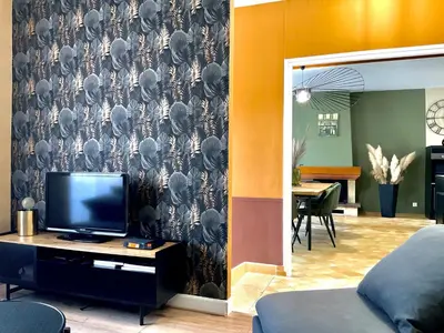 Télévision ou salle de divertissement dans l'établissement Gîte du Grand Cellerier
