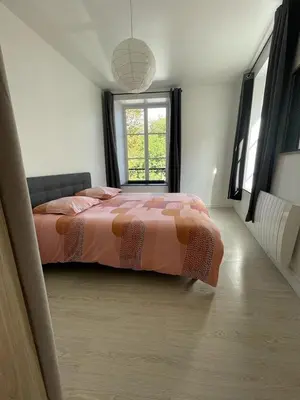 Un ou plusieurs lits dans un hébergement de l'établissement Appartement Le Petit Charcot