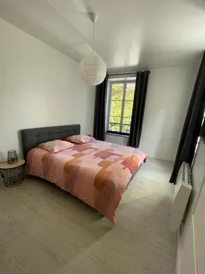 Un ou plusieurs lits dans un hébergement de l'établissement Appartement Le Petit Charcot