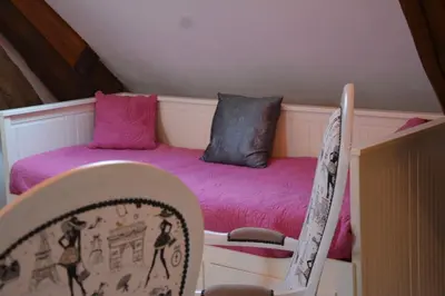 Un ou plusieurs lits dans un hébergement de l'établissement La Maison Au 1894 bulles de bonheur et Spa
