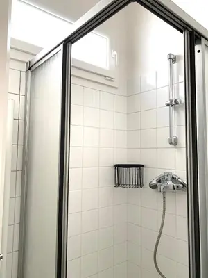Salle de bains dans l'établissement La Petite Rémoise - Hyper Centre