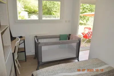 Un ou plusieurs lits dans un hébergement de l'établissement Maisonette Vallée de l'Automne Streaming & Vinyles