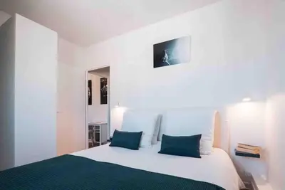 Un ou plusieurs lits dans un hébergement de l'établissement La Suite 7 Gîte Urbain