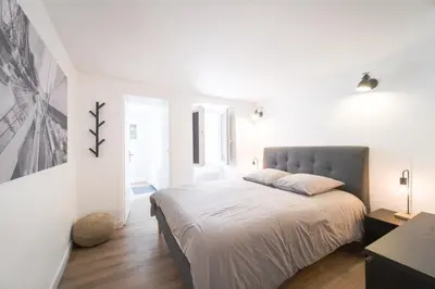 Un ou plusieurs lits dans un hébergement de l'établissement Appart' Terrasse plein centre