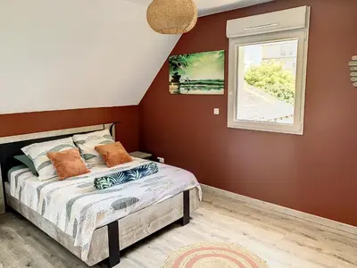 Un ou plusieurs lits dans un hébergement de l'établissement Chambre Zen - SDB WC Privatif - Entrée autonome - Grande TV NETFLIX