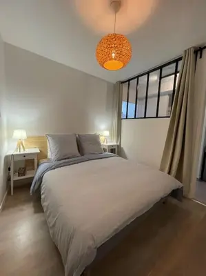 Un ou plusieurs lits dans un hébergement de l'établissement Appartement T2 La Ferté Gaucher à 200m du centre
