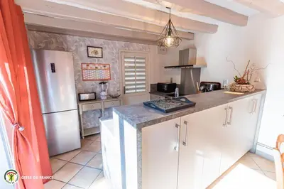 Cuisine ou kitchenette dans l'établissement Les Impériales