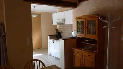 Cuisine ou kitchenette dans l'établissement Aux trois sapins