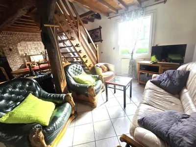 Coin salon dans l'établissement Le p'tit bourquin