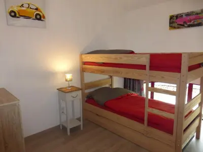 Un ou plusieurs lits dans un hébergement de l'établissement La grange