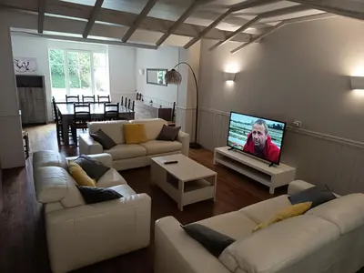Télévision ou salle de divertissement dans l'établissement Le gite du mazagran