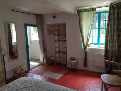 Un ou plusieurs lits dans un hébergement de l'établissement Gite de la Pierre Bleue, Authentique Maison à la campagne