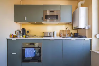 Cuisine ou kitchenette dans l'établissement Blue Velvet Reims