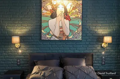 Un ou plusieurs lits dans un hébergement de l'établissement Suites MANA - Cupidon avec superbe vue Place Ducale Parking inclus