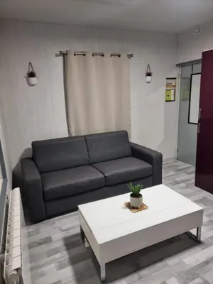 Coin salon dans l'établissement Studio Quai 1 Voie A parking gratuit