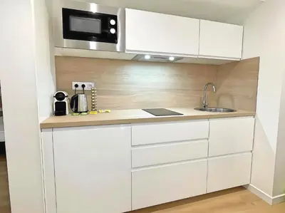 Cuisine ou kitchenette dans l'établissement Les fauvettes - Centre ville