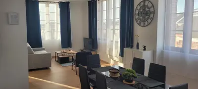 Coin salon dans l'établissement T2 neuf hypercentre 5 couchages