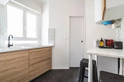 Cuisine ou kitchenette dans l'établissement Le Jaurès - moderne 2 chambres - hyper centre