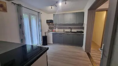 Cuisine ou kitchenette dans l'établissement Appartement Rethel - Netflix - Marc & cécile