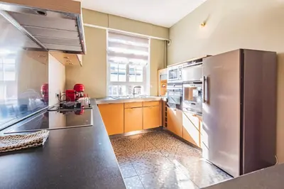 Cuisine ou kitchenette dans l'établissement Hyper center Sauna air conditionner