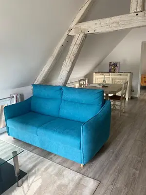 Coin salon dans l'établissement Le Cosy de Roseline