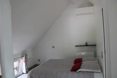 Un ou plusieurs lits dans un hébergement de l'établissement Le Cosy de Roseline