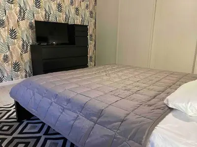 Un ou plusieurs lits dans un hébergement de l'établissement Les berges du canal, maison avec Jacuzzi