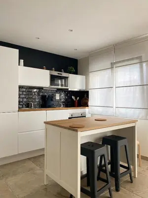 Cuisine ou kitchenette dans l'établissement Au chalet