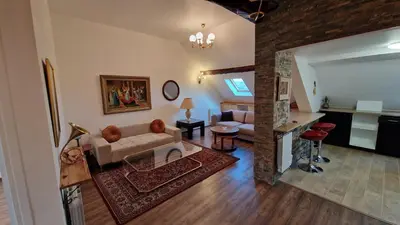 Coin salon dans l'établissement La Cigogne
