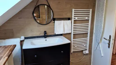 Salle de bains dans l'établissement La Cigogne