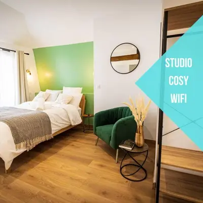 Un ou plusieurs lits dans un hébergement de l'établissement L'Albatros 004 - Hypercentre * Cosy * Wifi