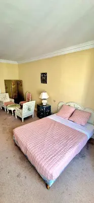 Un ou plusieurs lits dans un hébergement de l'établissement Hôtel de la cloche