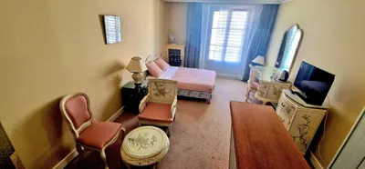 Télévision ou salle de divertissement dans l'établissement Hôtel de la cloche