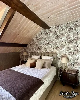 Un ou plusieurs lits dans un hébergement de l'établissement Part des Anges - Gîte Hautvillers