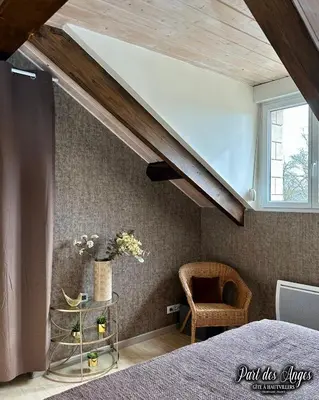 Un ou plusieurs lits dans un hébergement de l'établissement Part des Anges - Gîte Hautvillers