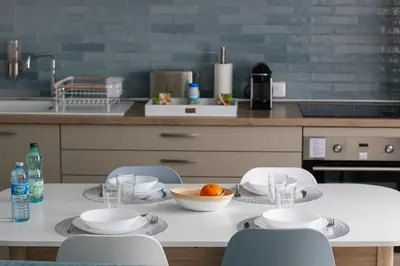 Cuisine ou kitchenette dans l'établissement Cocon d'Hiver - Netflix & Wifi - Parking Gratuit - check-in 24H24 - Kit Bébé disponible sur demande - Emplacement Vélos - GoodMarning