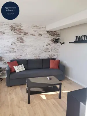 Coin salon dans l'établissement Les Bras de Morphée