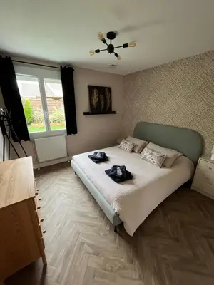 Un ou plusieurs lits dans un hébergement de l'établissement Maison familiale 100m2