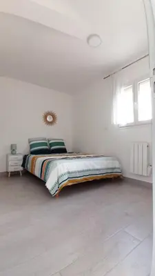 Un ou plusieurs lits dans un hébergement de l'établissement Maisonnette entière et privée, 600m de la gare