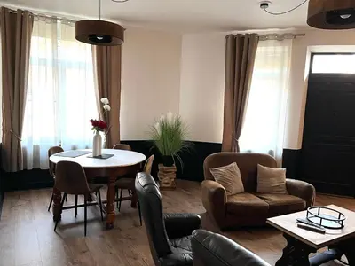 Coin salon dans l'établissement L'Estaminet Meublé de Tourisme Classé 2 étoiles